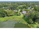 Aerial view of property on waterfront lot, near a lake at 1803 E Kaley Ave, Orlando, FL 32806