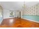 Spacious bedroom with hardwood floors and built-in cabinets at 1803 E Kaley Ave, Orlando, FL 32806