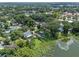 Aerial showing home near lake and neighborhood at 1803 E Kaley Ave, Orlando, FL 32806