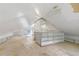 Unfinished attic space with built-in shelving at 1803 E Kaley Ave, Orlando, FL 32806