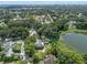 Aerial view of property near lake and residential area at 1803 E Kaley Ave, Orlando, FL 32806