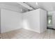 Spacious bonus room with tile flooring and exterior access at 1803 E Kaley Ave, Orlando, FL 32806