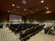 Community theater room with comfortable seating at 4963 Pall Mall E St, Kissimmee, FL 34758
