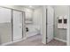 Bathroom with shower, tub, and linen closet at 3443 Islewood Ct, Ocoee, FL 34761
