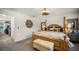 Elegant bedroom with a four-poster bed and stylish decor at 1105 Pacific Dunes Ct, Daytona Beach, FL 32124