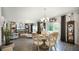Open concept dining area with chandelier and view of living room at 1105 Pacific Dunes Ct, Daytona Beach, FL 32124