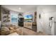 Fun game room with arcade game and comfortable seating at 1105 Pacific Dunes Ct, Daytona Beach, FL 32124