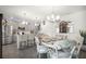Modern kitchen with gray cabinets, island, and stainless steel appliances at 1105 Pacific Dunes Ct, Daytona Beach, FL 32124