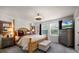 Lovely bedroom with a king-size bed and large windows at 1105 Pacific Dunes Ct, Daytona Beach, FL 32124