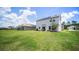 Spacious backyard with a large grassy area at 1105 Pacific Dunes Ct, Daytona Beach, FL 32124