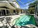 Relaxing pool and patio area with covered lanai and hammock at 1817 Baillie Glass Ln, Orlando, FL 32835