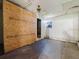 Unfinished basement area with plywood walls at 1440 Walker Rd, Lakeland, FL 33810