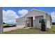 Single-story home with stone accents at 6804 Serpent Hawk Lane St, Howey In The Hills, FL 34737