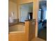 Bathroom with corner bathtub, separate shower, and vanity at 1597 Heritage Crossing Ct # 202, Reunion, FL 34747