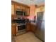Well-equipped kitchen with stainless steel appliances at 1597 Heritage Crossing Ct # 202, Reunion, FL 34747