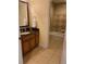 Bathroom with vanity, sink, and tub at 1597 Heritage Crossing Ct # 202, Reunion, FL 34747