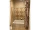 Clean bathroom with shower/tub combo and updated fixtures at 1597 Heritage Crossing Ct # 202, Reunion, FL 34747