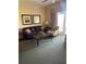 Comfortable living room featuring plush seating and a coffee table at 1597 Heritage Crossing Ct # 202, Reunion, FL 34747