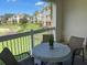Enjoy morning coffee on this balcony with golf course views at 1597 Heritage Crossing Ct # 202, Reunion, FL 34747