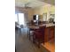 Open kitchen with breakfast bar and seating at 1597 Heritage Crossing Ct # 202, Reunion, FL 34747