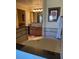 Bathroom with double vanity and a large soaking tub at 1597 Heritage Crossing Ct # 202, Reunion, FL 34747