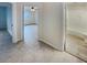 Long hallway with access to bedrooms and bathrooms at 4934 Samoa Cir # 7, Orlando, FL 32808