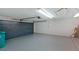 Attached garage with ample space and painted floor at 4934 Samoa Cir # 7, Orlando, FL 32808