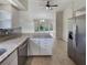 Kitchen with stainless steel appliances and granite counters at 4934 Samoa Cir # 7, Orlando, FL 32808