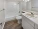Clean bathroom with a single sink vanity and tub shower at 4934 Samoa Cir # 7, Orlando, FL 32808