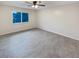 Spacious bedroom with ceiling fan and neutral walls at 4934 Samoa Cir # 7, Orlando, FL 32808