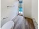 Bathroom with toilet and door leading to the pool at 4934 Samoa Cir # 7, Orlando, FL 32808