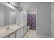 Bathroom with double vanity and shower tub at 12337 Greco Dr, Orlando, FL 32824