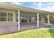 Brick paved patio with covered porch at 12337 Greco Dr, Orlando, FL 32824