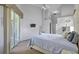 Main bedroom with a large bed and access to the bathroom at 12337 Greco Dr, Orlando, FL 32824