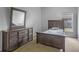 Bedroom with dresser and a full-size bed at 12337 Greco Dr, Orlando, FL 32824
