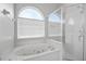 Relaxing bathroom with a jetted tub and separate shower at 12337 Greco Dr, Orlando, FL 32824