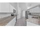 Modern kitchen with white shaker cabinets and granite countertops at 12337 Greco Dr, Orlando, FL 32824