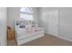 Cozy bedroom with built-in shelving and a day bed at 12337 Greco Dr, Orlando, FL 32824