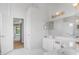 Bathroom with double vanity and a view into another room at 12337 Greco Dr, Orlando, FL 32824