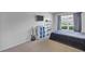 Bright bedroom with double bed and guitar at 12337 Greco Dr, Orlando, FL 32824