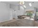 Bright living room with high ceilings, skylights and L-shaped sofa at 12337 Greco Dr, Orlando, FL 32824
