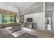 Spacious living room with L-shaped sofa and fireplace at 12337 Greco Dr, Orlando, FL 32824