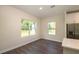 Bright dining area with wood-look floors and natural light at 34 Dogwood Dr Crse, Ocala, FL 34472