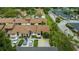 Aerial view showcasing a condo building and surrounding landscape at 2384 Sun Valley Cir, Winter Park, FL 32792