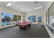 Relaxing game room featuring a billiard table and ample natural light at 3145 Sun Lake Ct # B, Kissimmee, FL 34747