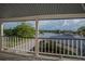 Porch with view of a lake and surrounding landscape at 16600 Cleveland Ln, Umatilla, FL 32784