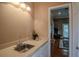 Convenient wet bar with a sink and countertop space at 16600 Cleveland Ln, Umatilla, FL 32784