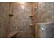 Large walk-in shower with tiled walls and built-in seat at 16600 Cleveland Ln, Umatilla, FL 32784