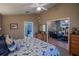 Main bedroom with ensuite bathroom and views of the living room at 16600 Cleveland Ln, Umatilla, FL 32784