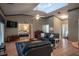 Living Room with leather sofas and view of main bedroom at 16600 Cleveland Ln, Umatilla, FL 32784